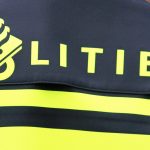 Stock – logo Politie op de rug